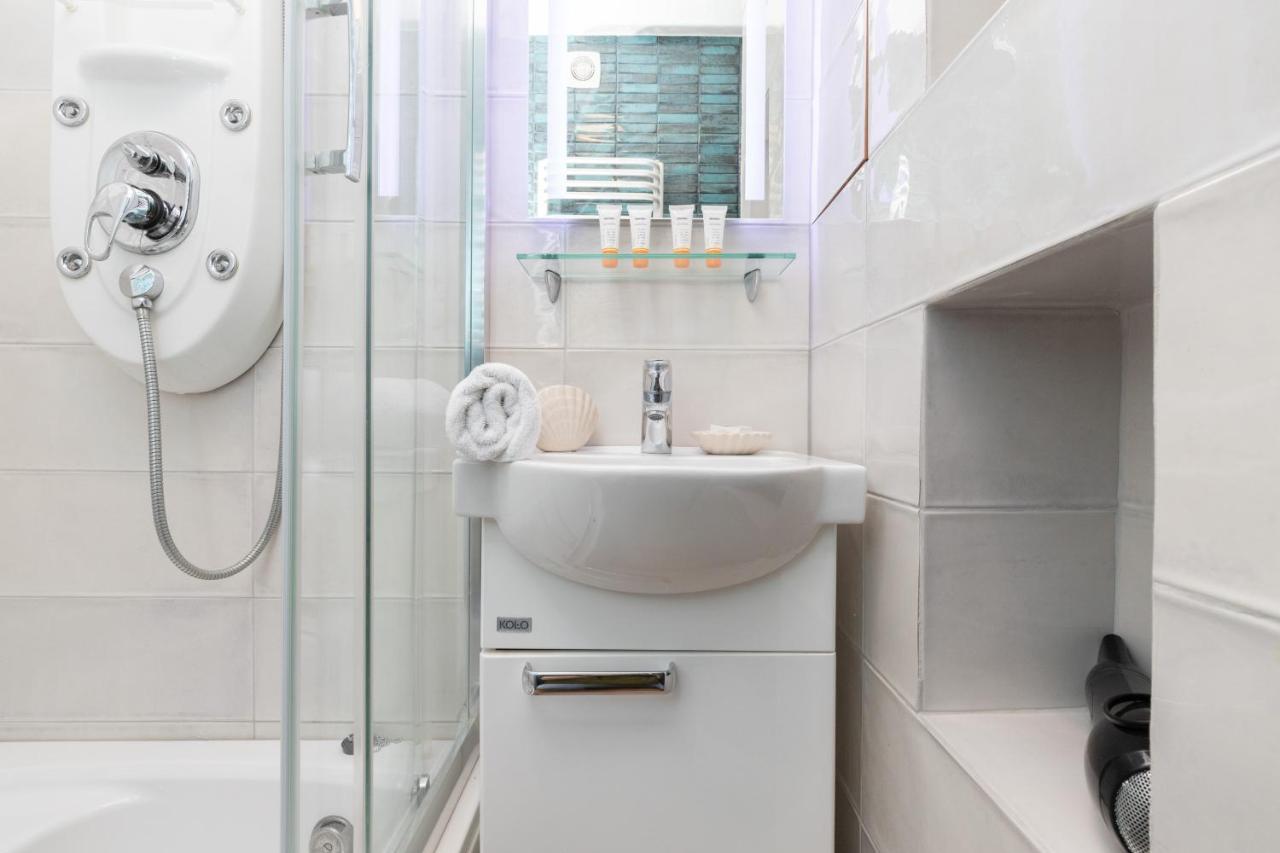 Mokotow Apartments Reytan By Noclegi Renters Warsaw Luaran gambar